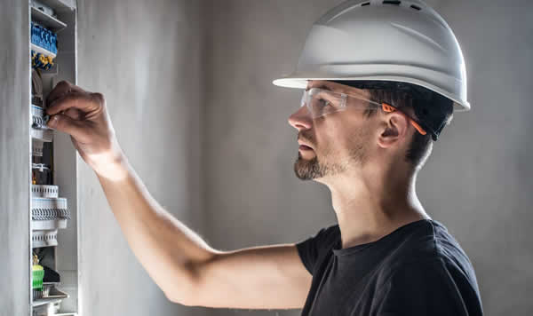 electrician working switchboard