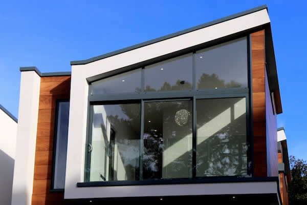 front of modern house with large windows
