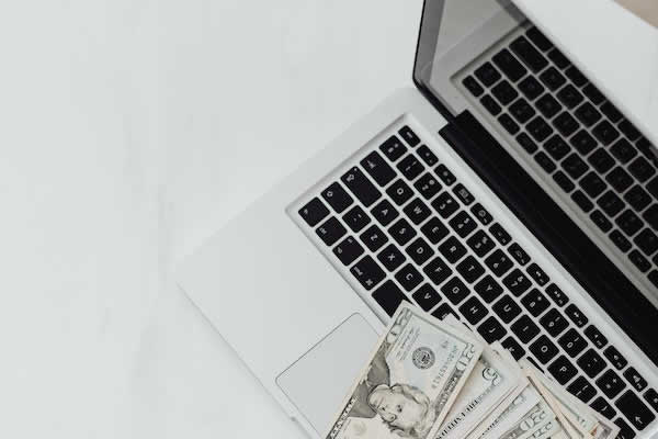 laptop with money