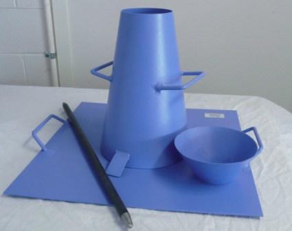 slump cone, tamping rod and flat surface