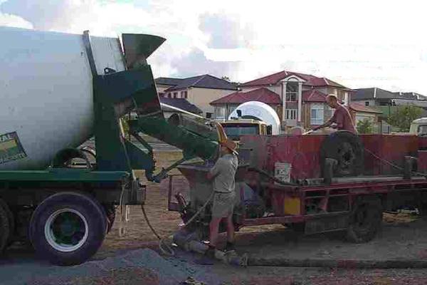 adding water to concrete on site