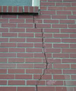 Cracked brick wall