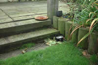 Railway ties used for steps and a porch