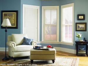 Wood blinds with 1" slats housed within window frame