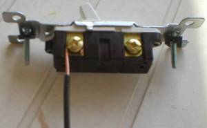 Incorrect terminal device wiring, wire has been stripped back to far.