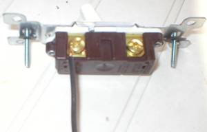 Correct method of attaching a wire to a device terminal screw.
