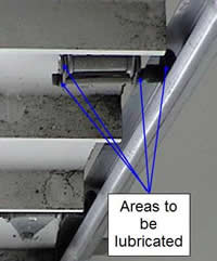 lubricating garage door track and rollers