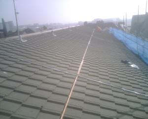 Copper bar installed on roof to control moss growth